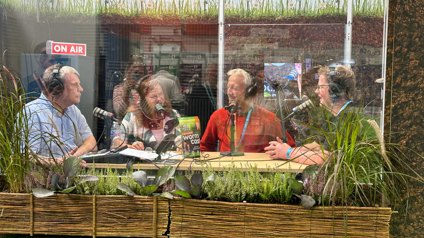 Charles Dowding and Chris Holgreaves from Urban Wyrm sit in a recording booth with the two hosts of the Underground Podcast